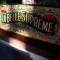 LaBelle Supreme Glue Chipped Reverse Glass Sign